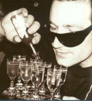 Bono mixing a drink